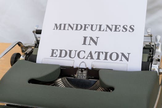 Close-up of a typewriter with paper showing 'Mindfulness in Education'.